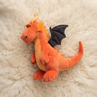 Gosedjur orange drake med svarta vingar
