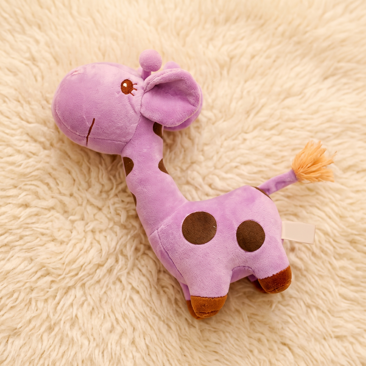 Gosedjur giraff lila mjuk med svarta fläckar